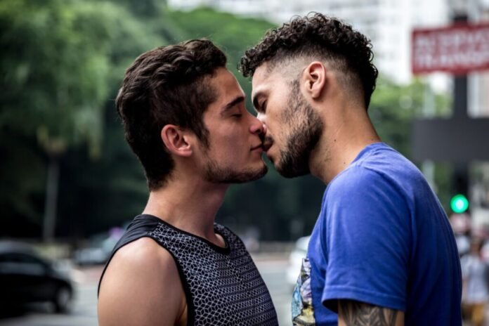 two-gay-men-kissing-on-the-street-deposit-photo-3-3-23-1024x683